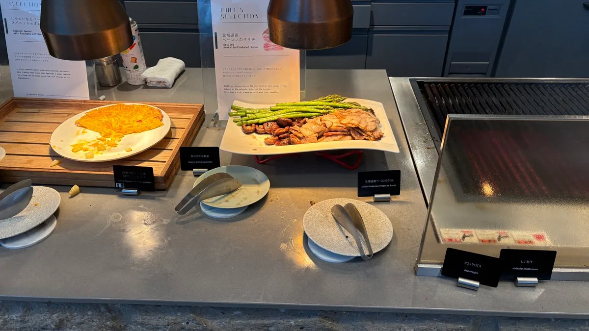 Grilled asparagus, bacon and shiitake mushrooms at the live kitchen counter